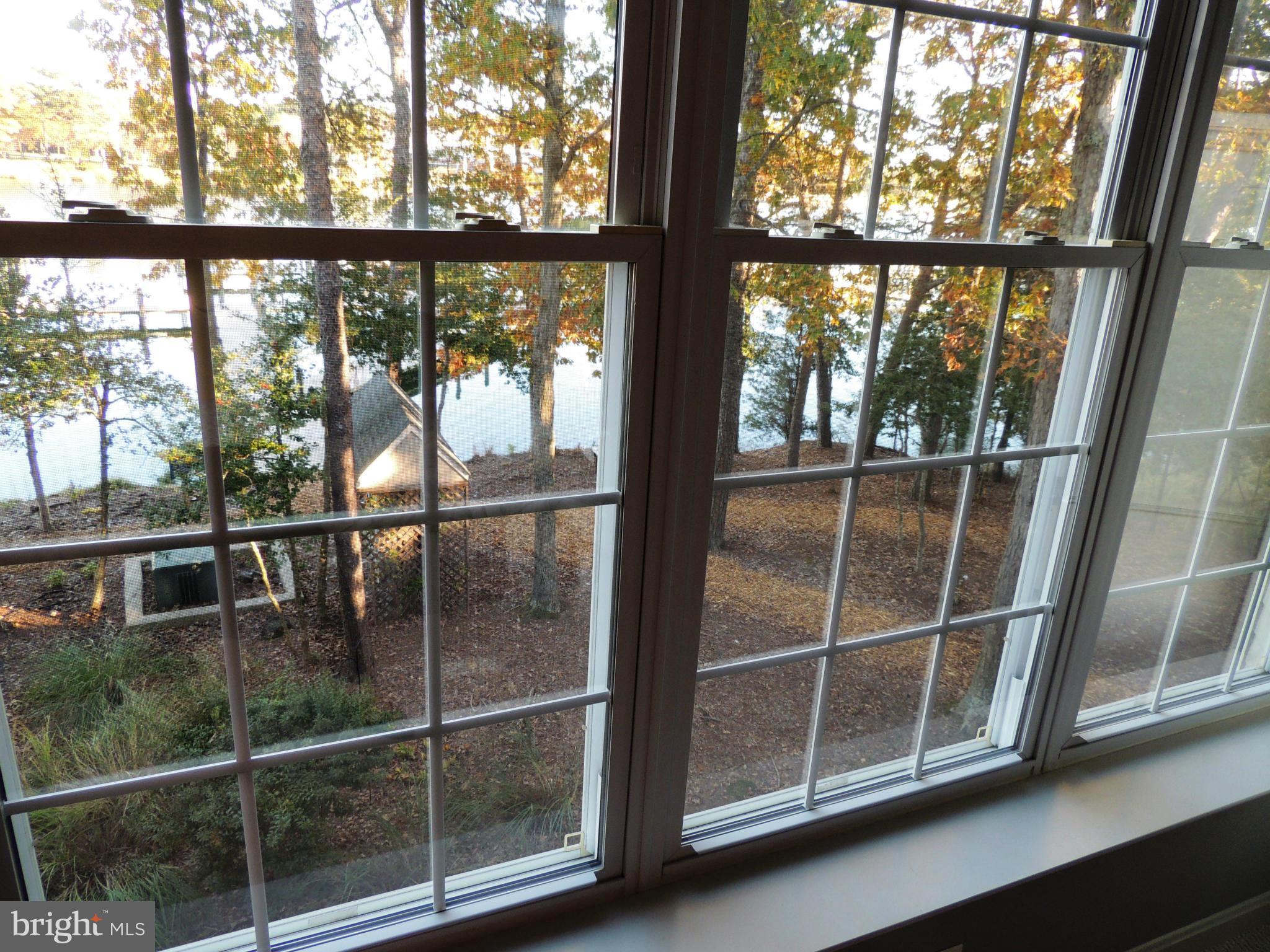 722 Runabout Loop, Unit 722 Solomons, MD 20688 - Photo 2 of 30 a view of a glass door with a glass door