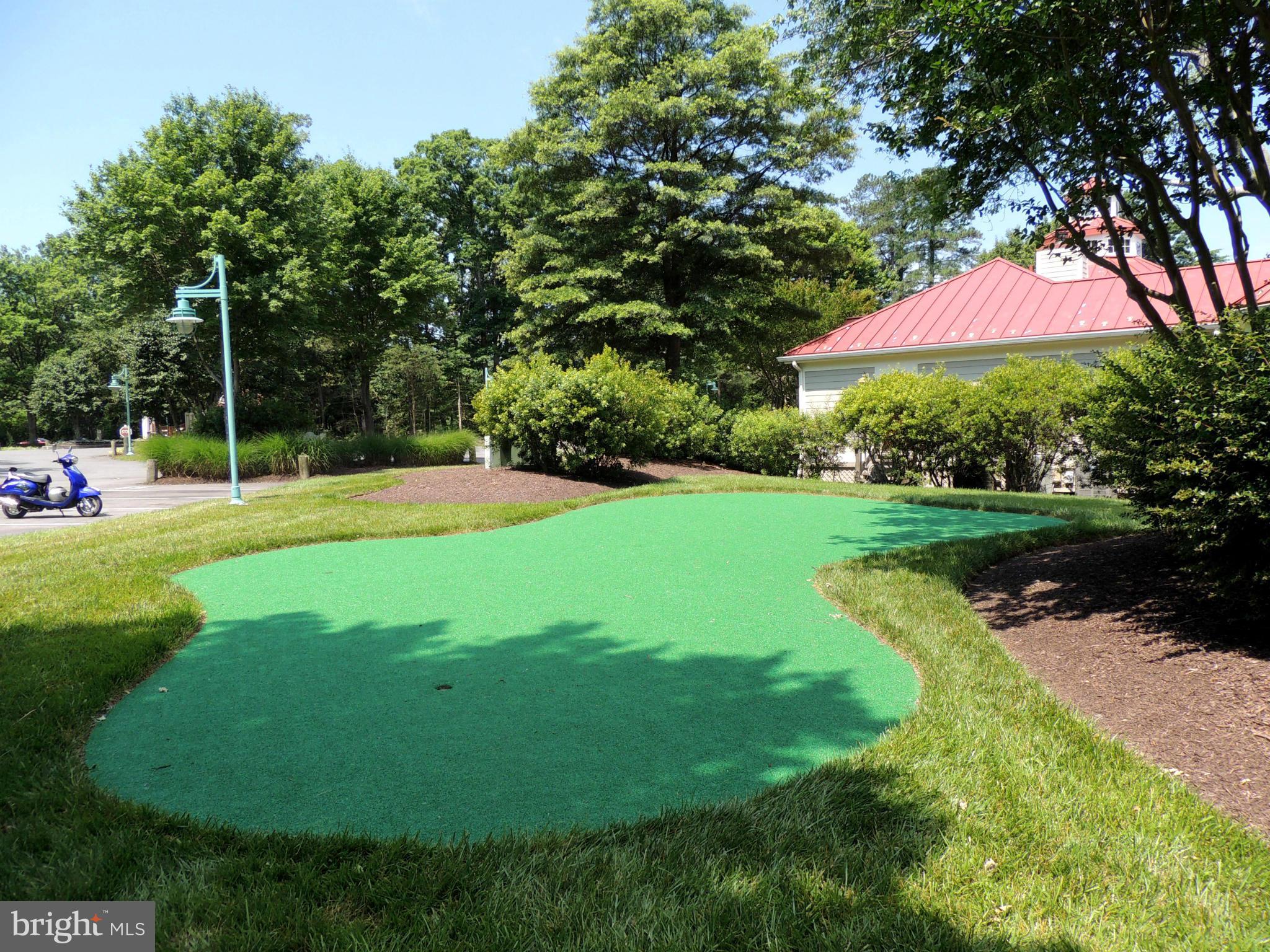 722 Runabout Loop, Unit 722 Solomons, MD 20688 - Photo 29 of 30 a view of a park with a tree