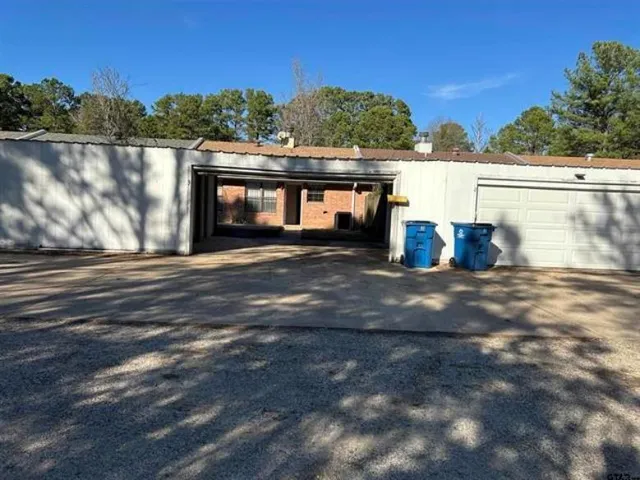 a view of a yard with an outdoor space