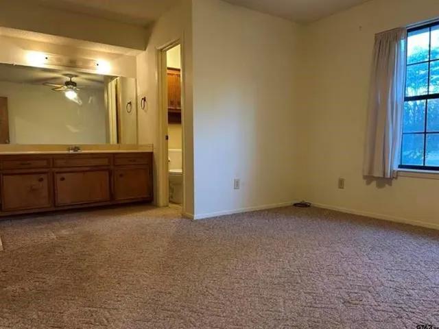 an empty room with window