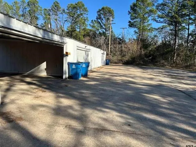a view of a backyard of the house