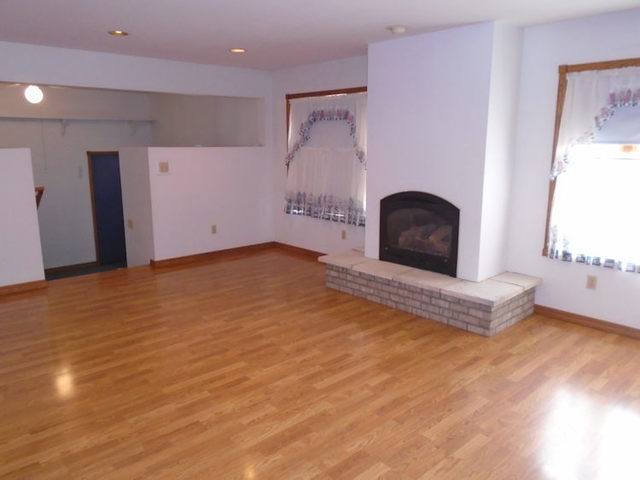 2048 Highway 251 Rochelle, IL 61068 - Photo 3 of 17 a view of a livingroom with a fireplace