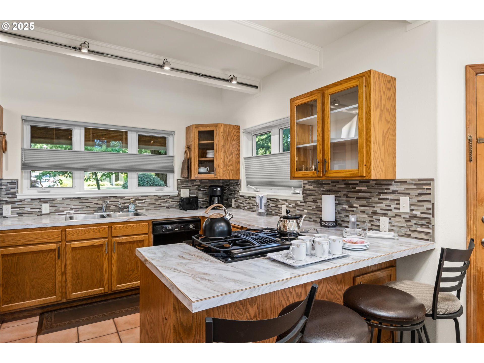 820 Park Terrace Eugene, OR 97404 - Photo 13 of 44 a kitchen with a sink cabinets and wooden floor