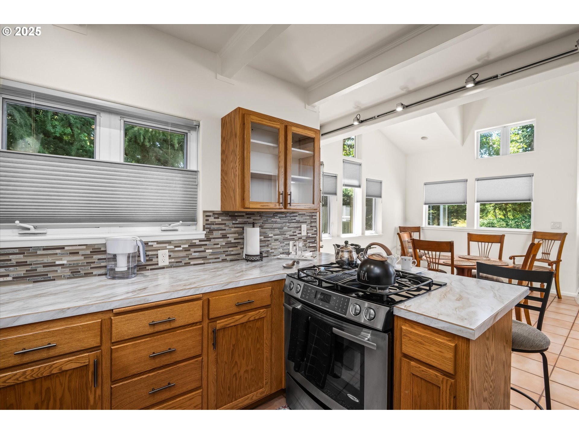 820 Park Terrace Eugene, OR 97404 - Photo 15 of 44 a kitchen with a sink stove and cabinets