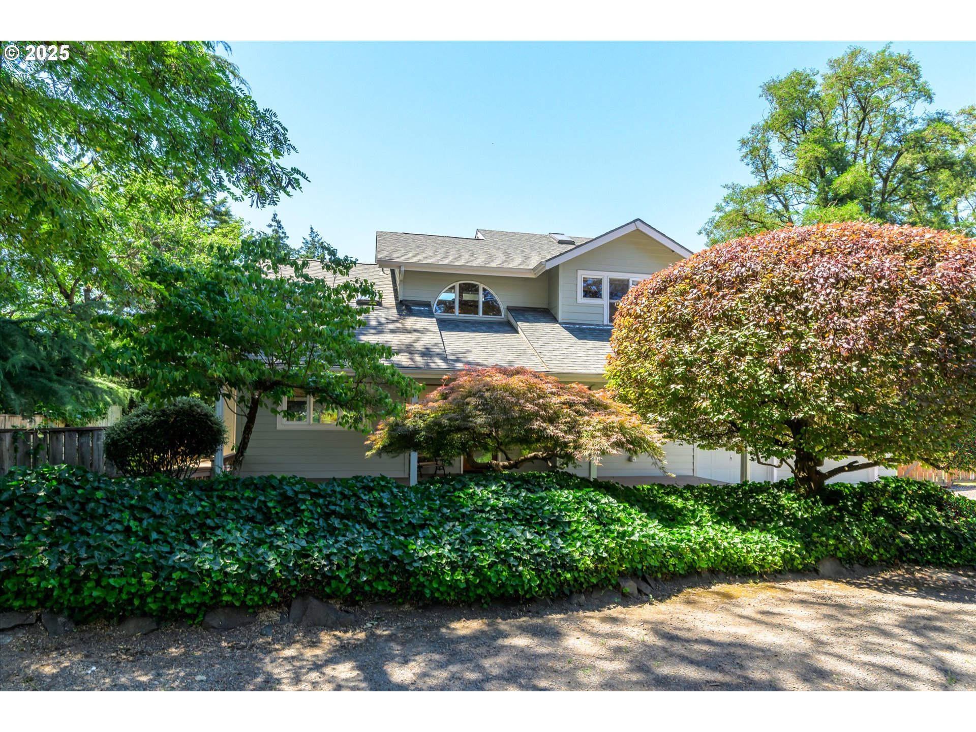 820 Park Terrace Eugene, OR 97404 - Photo 2 of 44 a house view with a garden