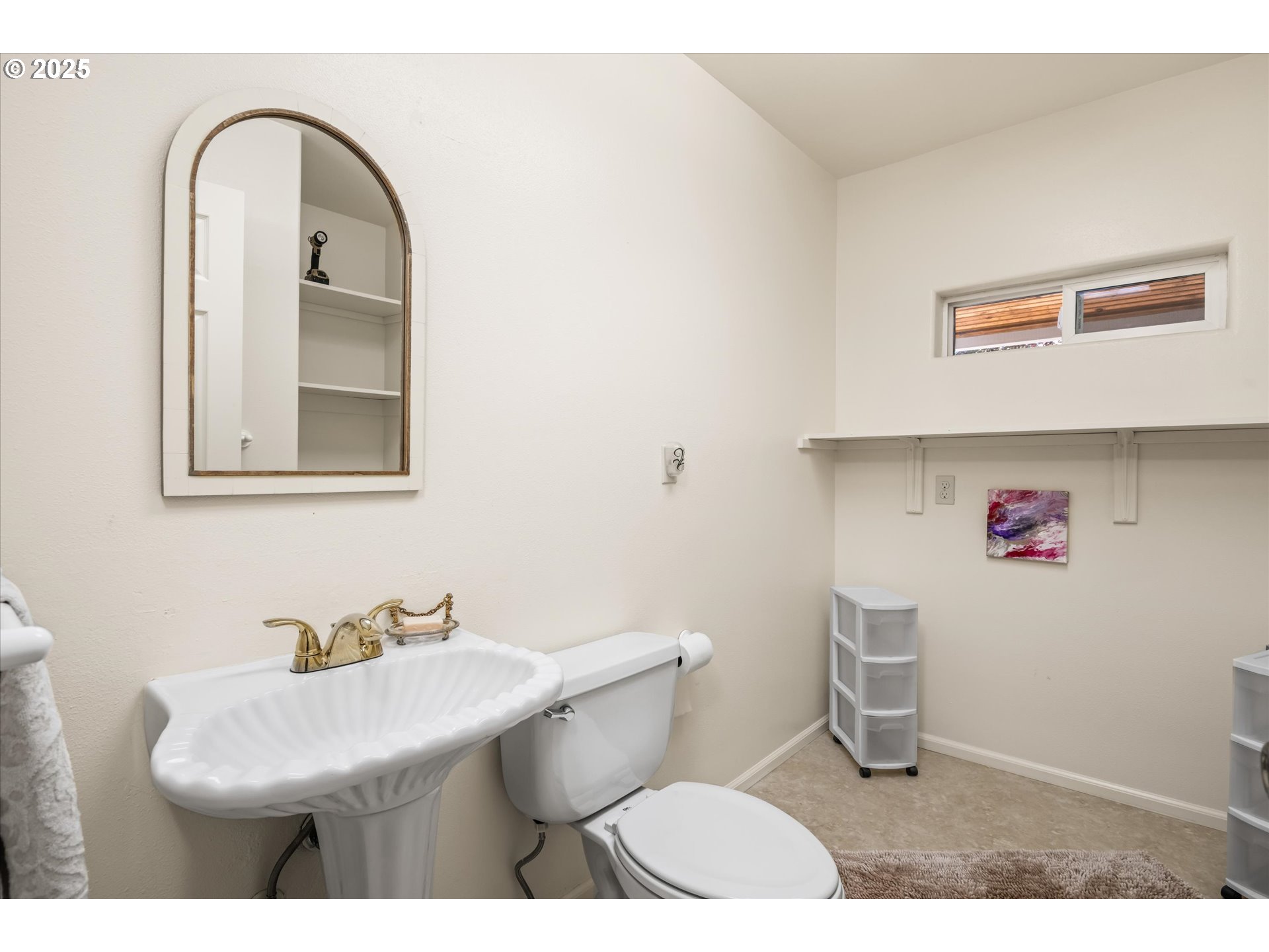 820 Park Terrace Eugene, OR 97404 - Photo 21 of 44 a bathroom with a sink a toilet and mirror