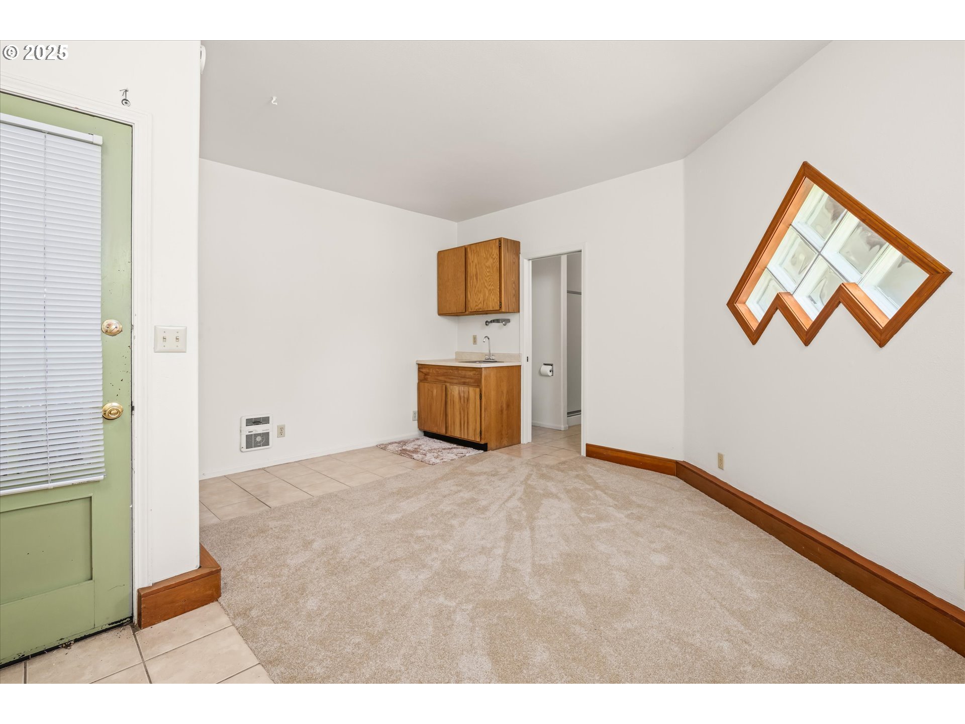 820 Park Terrace Eugene, OR 97404 - Photo 35 of 44 a bedroom with a bed and a painting on the wall