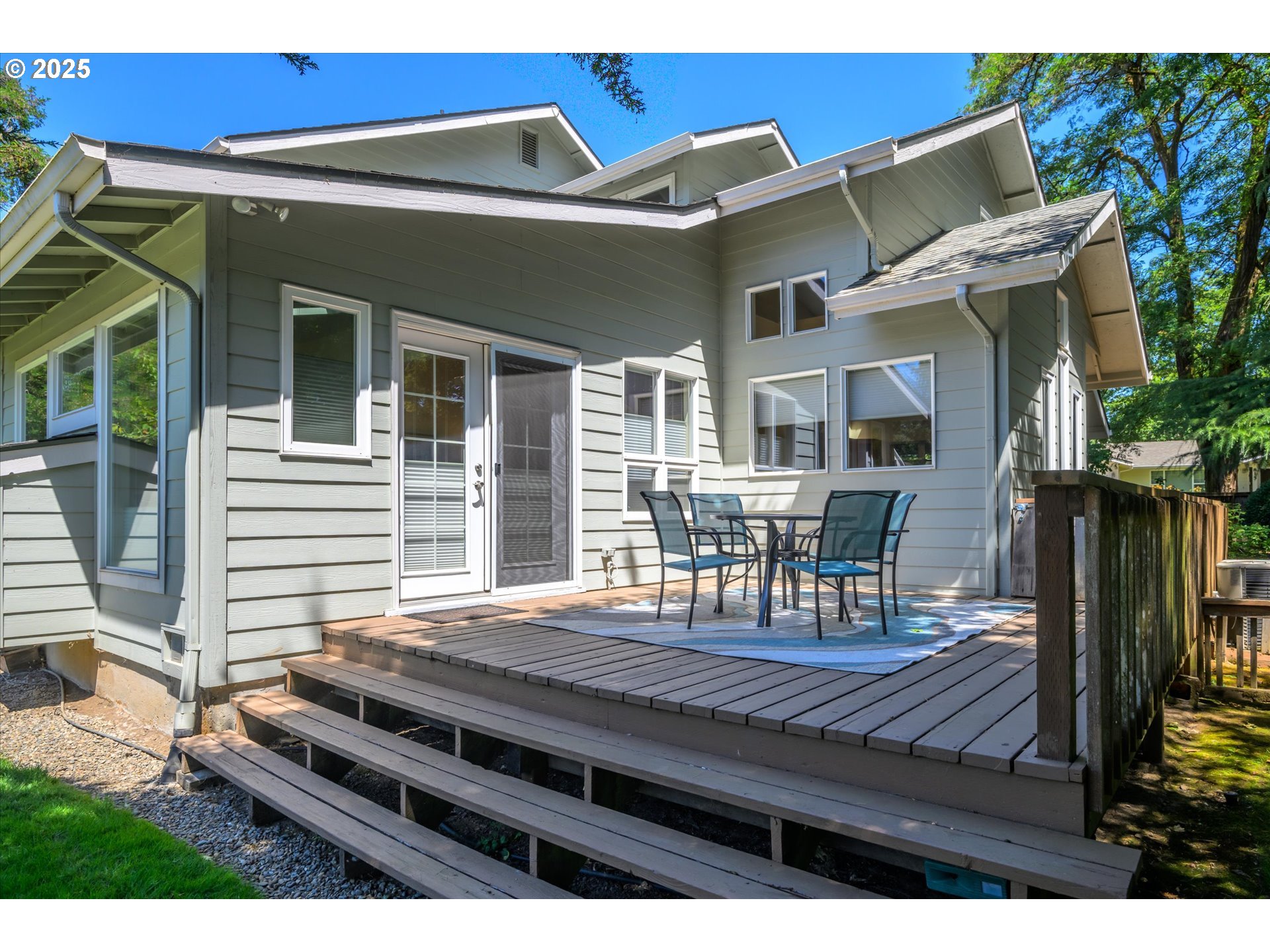 820 Park Terrace Eugene, OR 97404 - Photo 40 of 44 a view of a wooden chairs on the deck