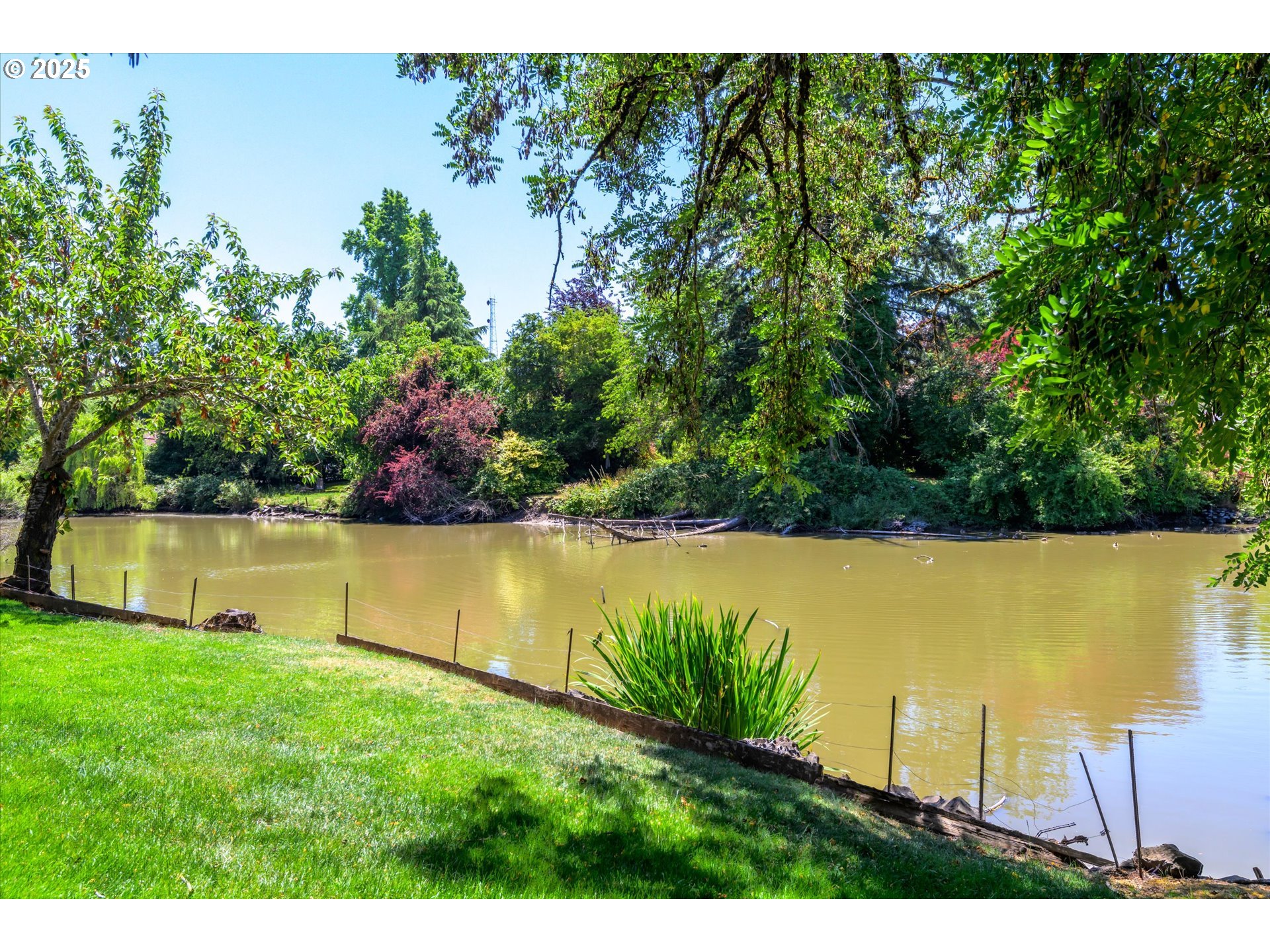 820 Park Terrace Eugene, OR 97404 - Photo 42 of 44 a view of a lake with a garden