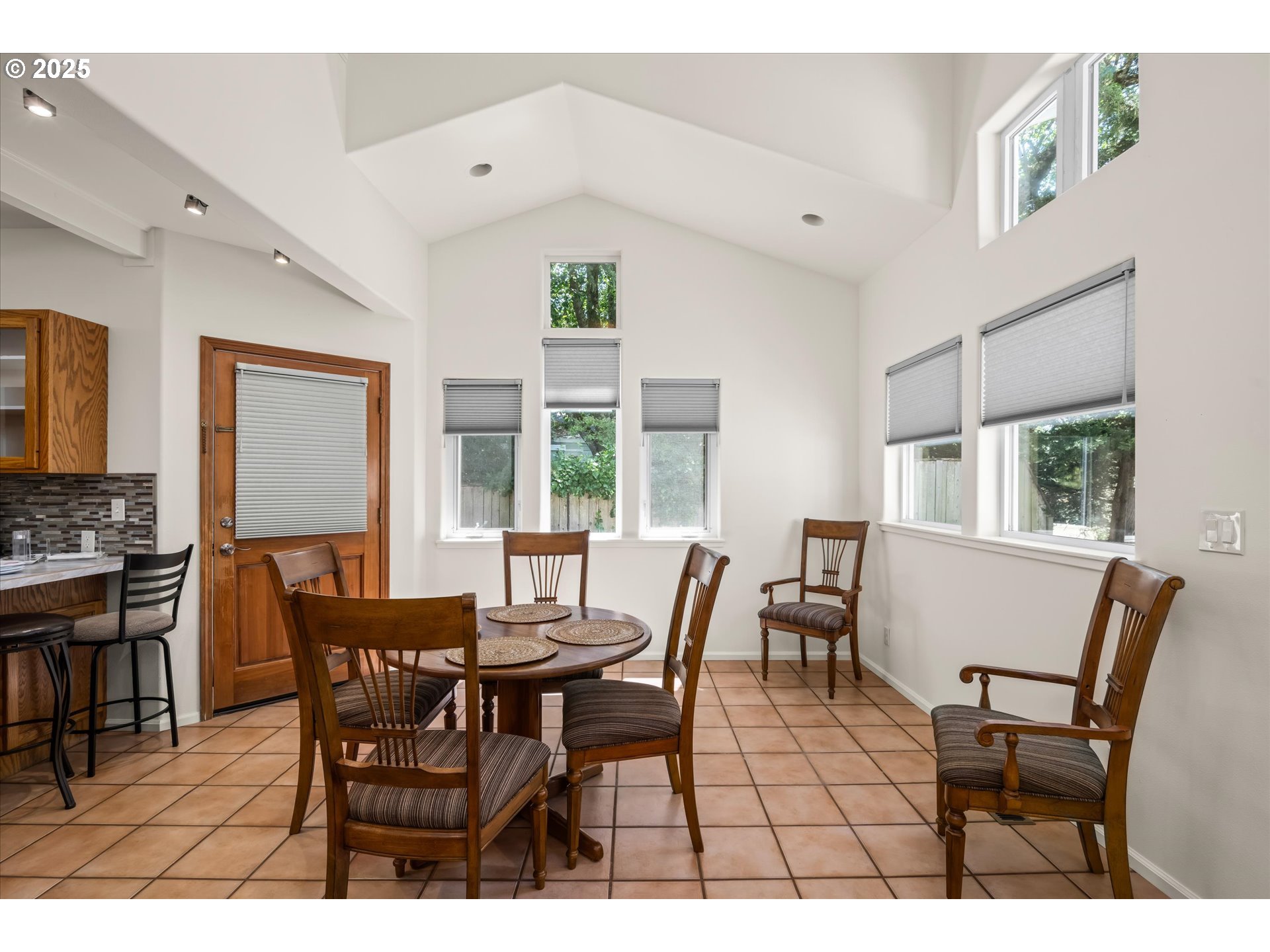 820 Park Terrace Eugene, OR 97404 - Photo 9 of 44 a view of a dining room with furniture and a window