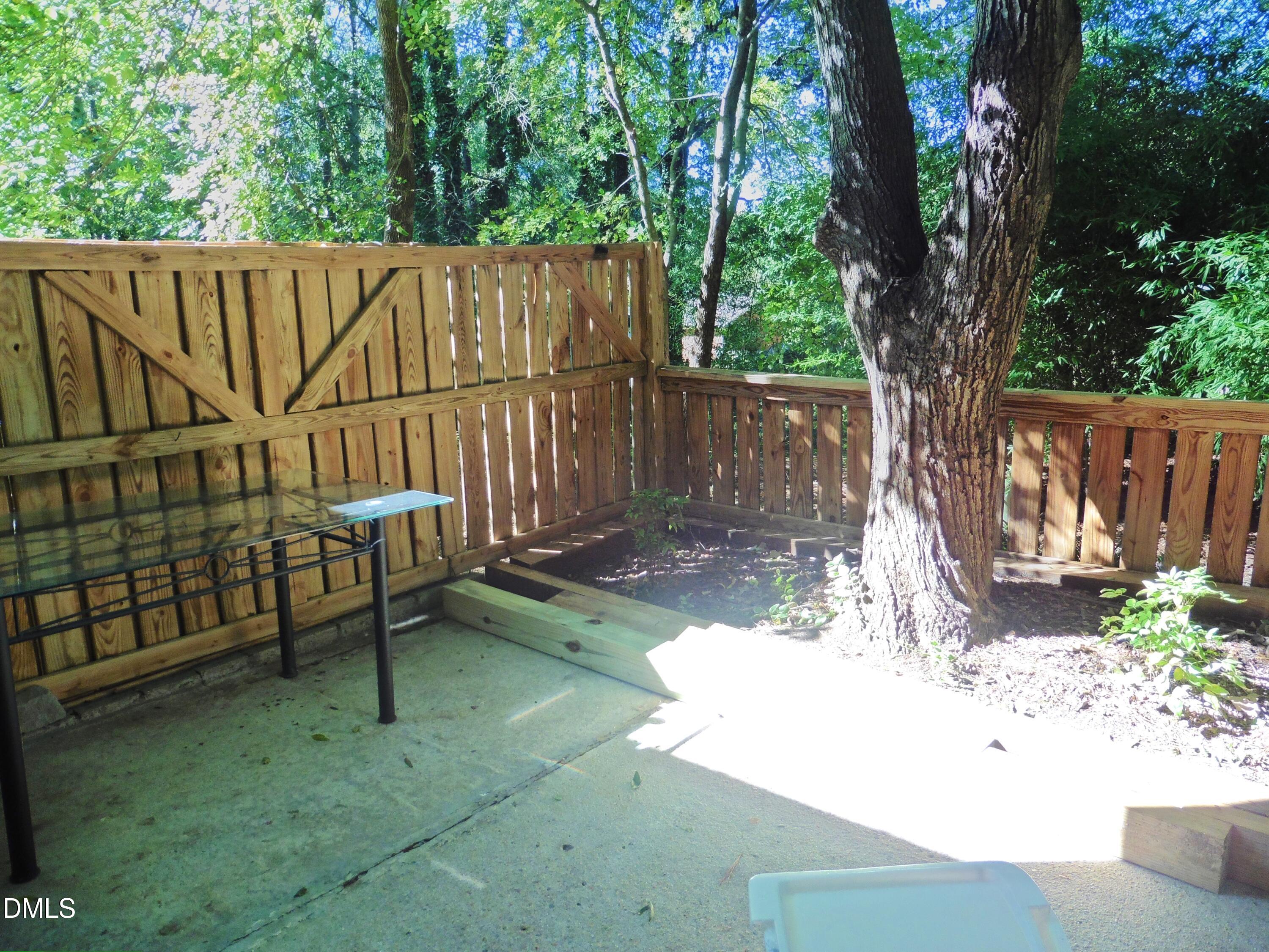 4257 Lake Ridge Drive Raleigh, NC 27604 - Photo 16 of 19 a view of backyard with a small cabin