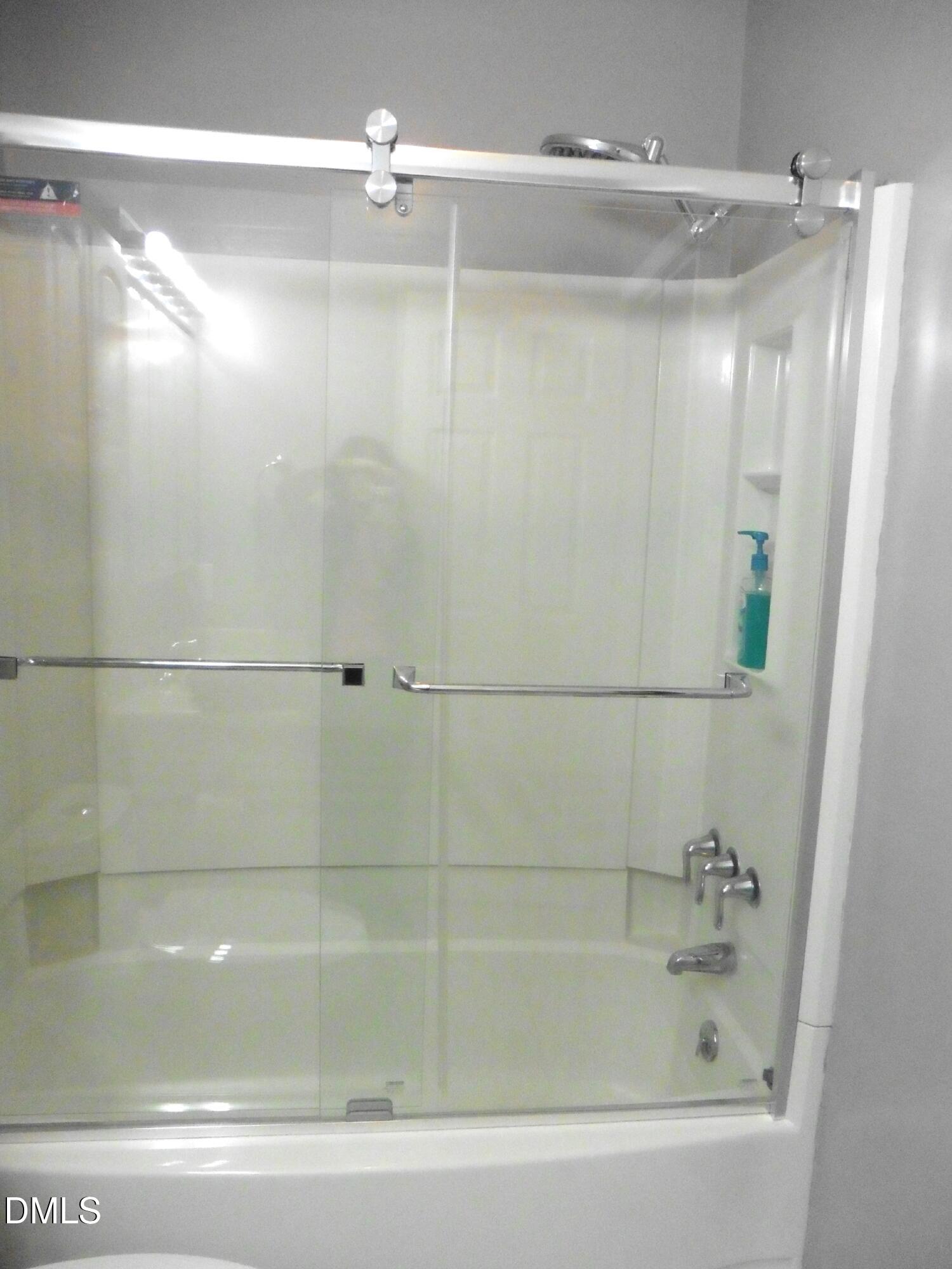 4257 Lake Ridge Drive Raleigh, NC 27604 - Photo 17 of 19 a bathroom with a shower and a bathtub