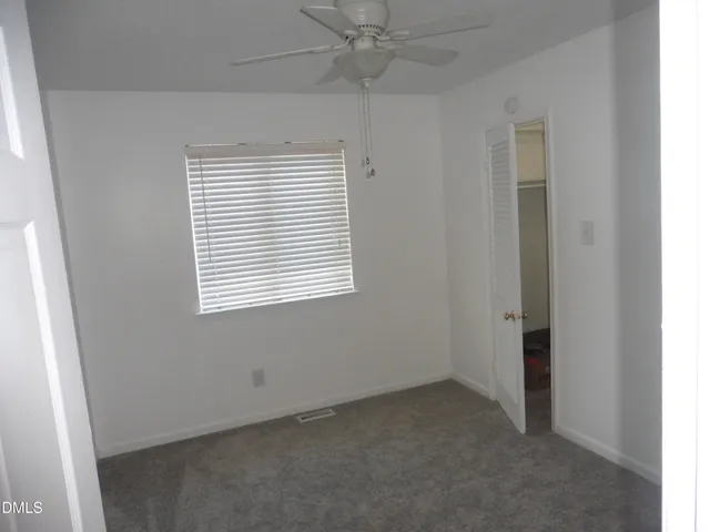 a view of a livingroom with a window