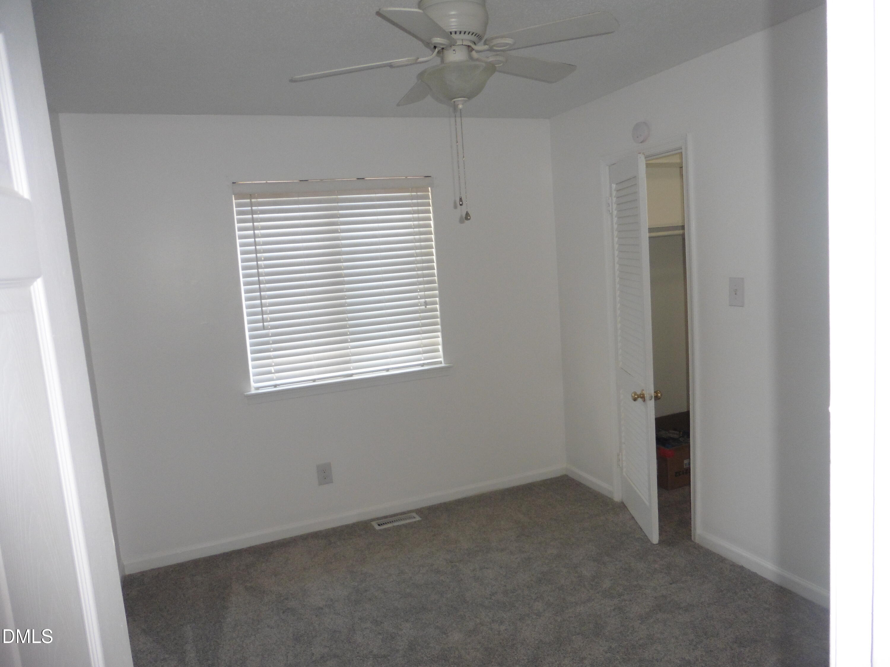 4257 Lake Ridge Drive Raleigh, NC 27604 - Photo 18 of 19 an empty room with a window
