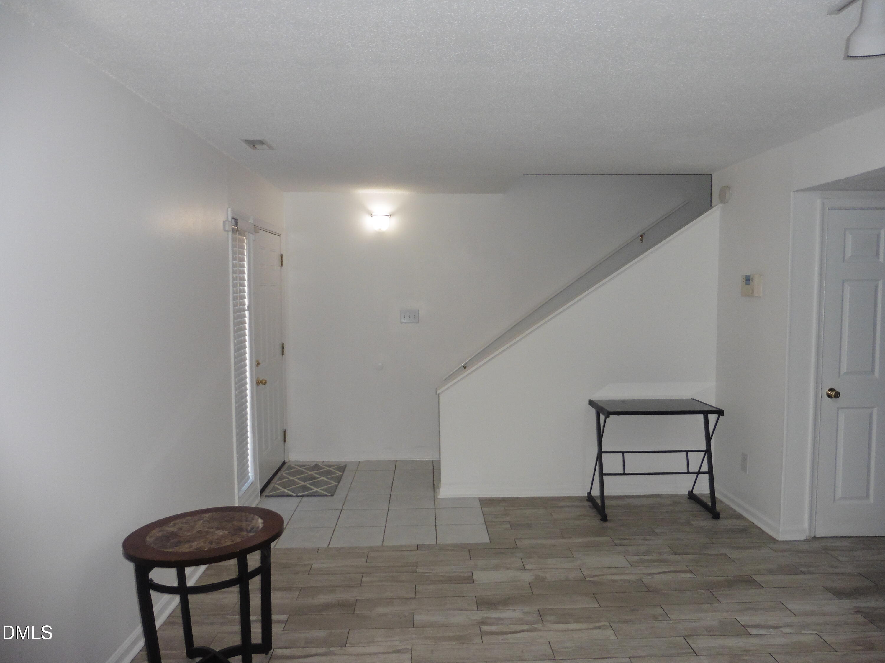 4257 Lake Ridge Drive Raleigh, NC 27604 - Photo 5 of 19 a view of a livingroom with furniture and wooden floor