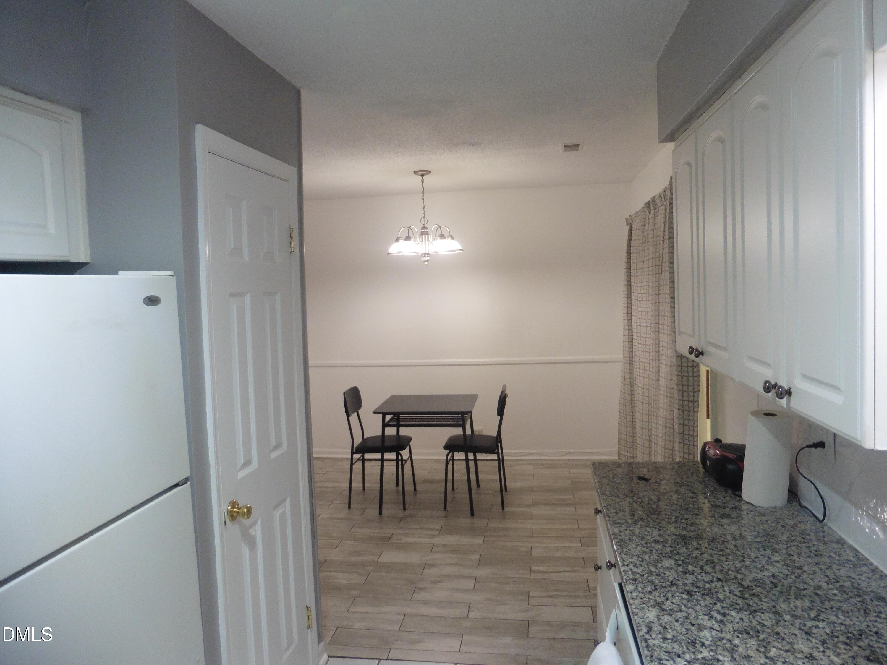 4257 Lake Ridge Drive Raleigh, NC 27604 - Photo 10 of 19 a view of a dining room with furniture