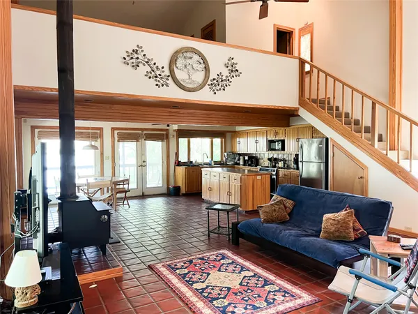 a living room with furniture and a table