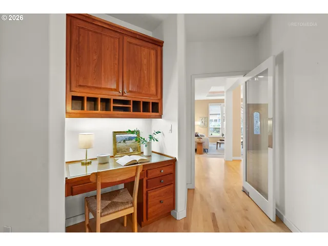 a bathroom with a sink a mirror and a shower