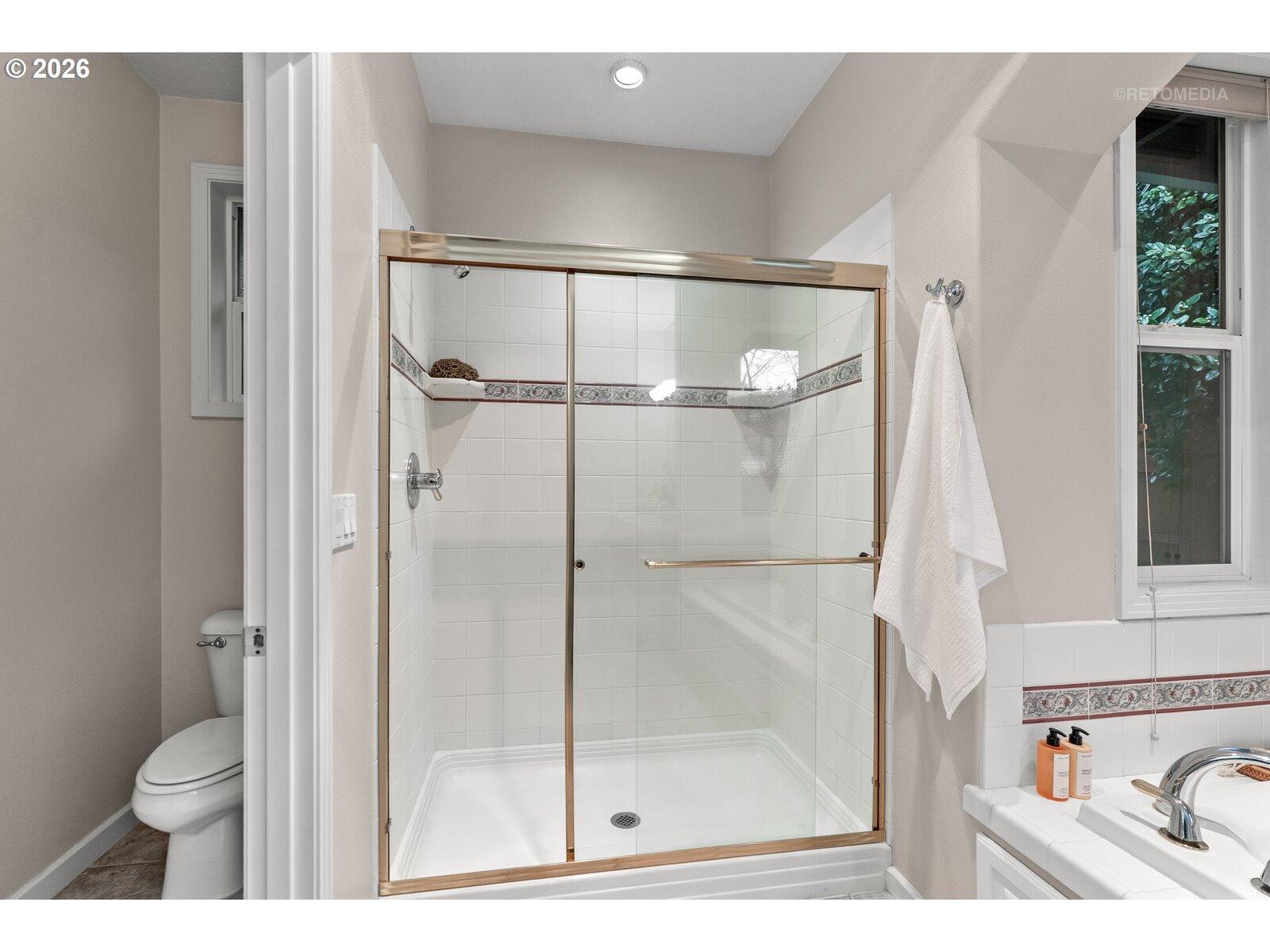 2625 Southwest 75th Terrace Portland, OR 97225 - Photo 19 of 45 a bathroom with a shower and a toilet