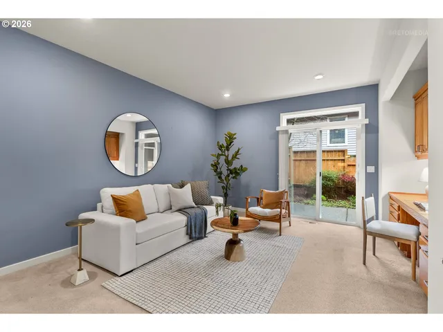 a kitchen with stainless steel appliances kitchen island granite countertop a sink dishwasher stove and cabinets
