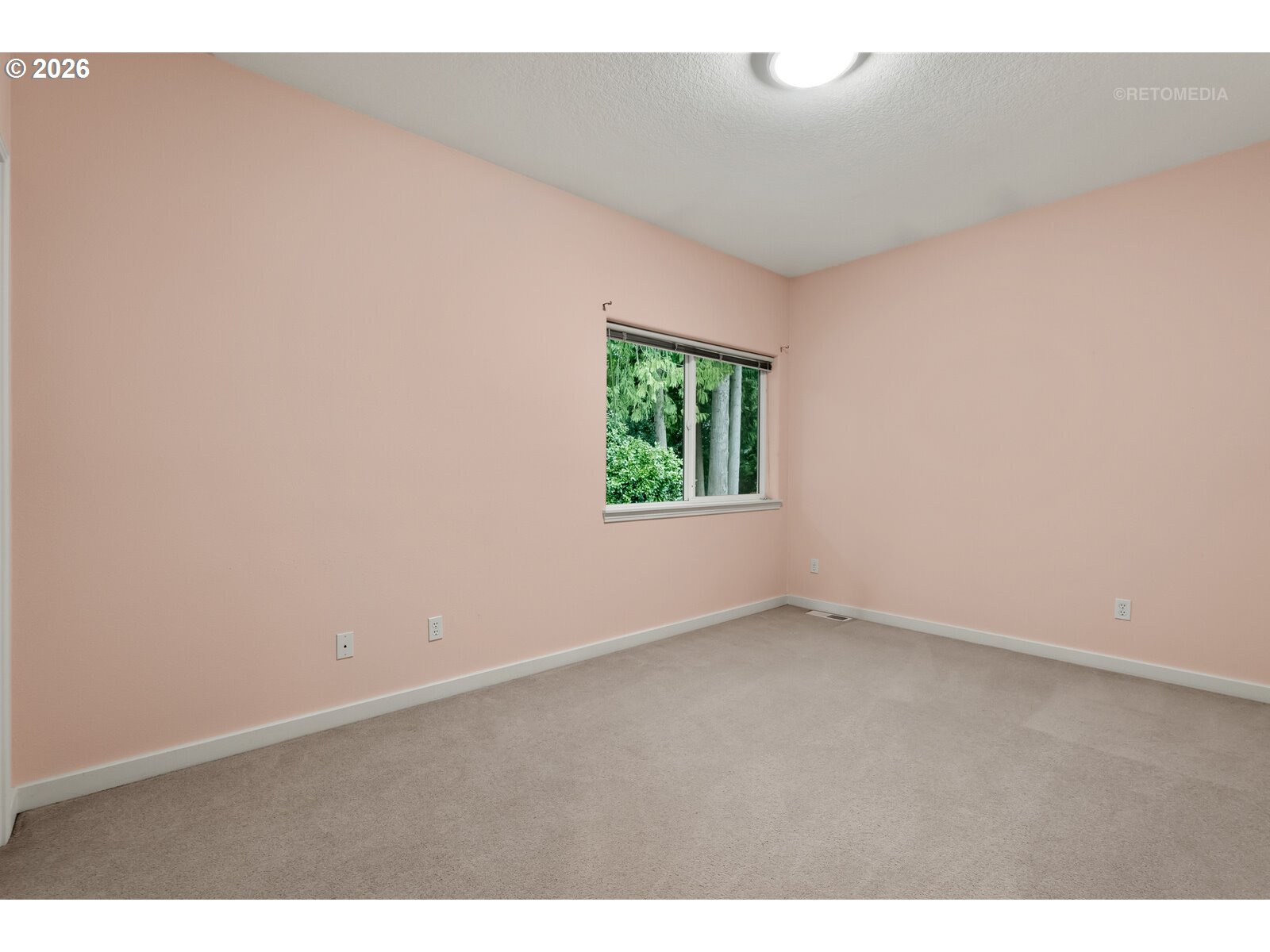 2625 Southwest 75th Terrace Portland, OR 97225 - Photo 29 of 45 an empty room with windows
