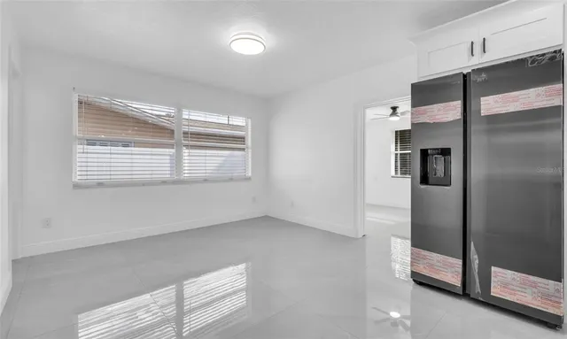 an empty room with closet area