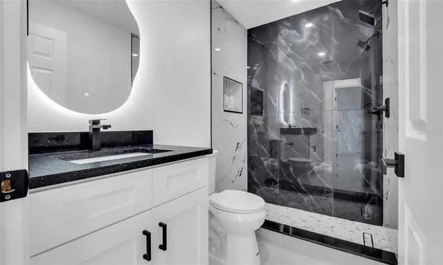 a view of a bathroom with a shower