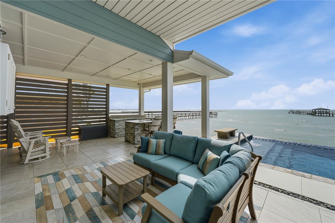 12 Sea Shell Shores Rockport, TX 78382 - Photo 32 of 40 a terrace with outdoor seating and water view