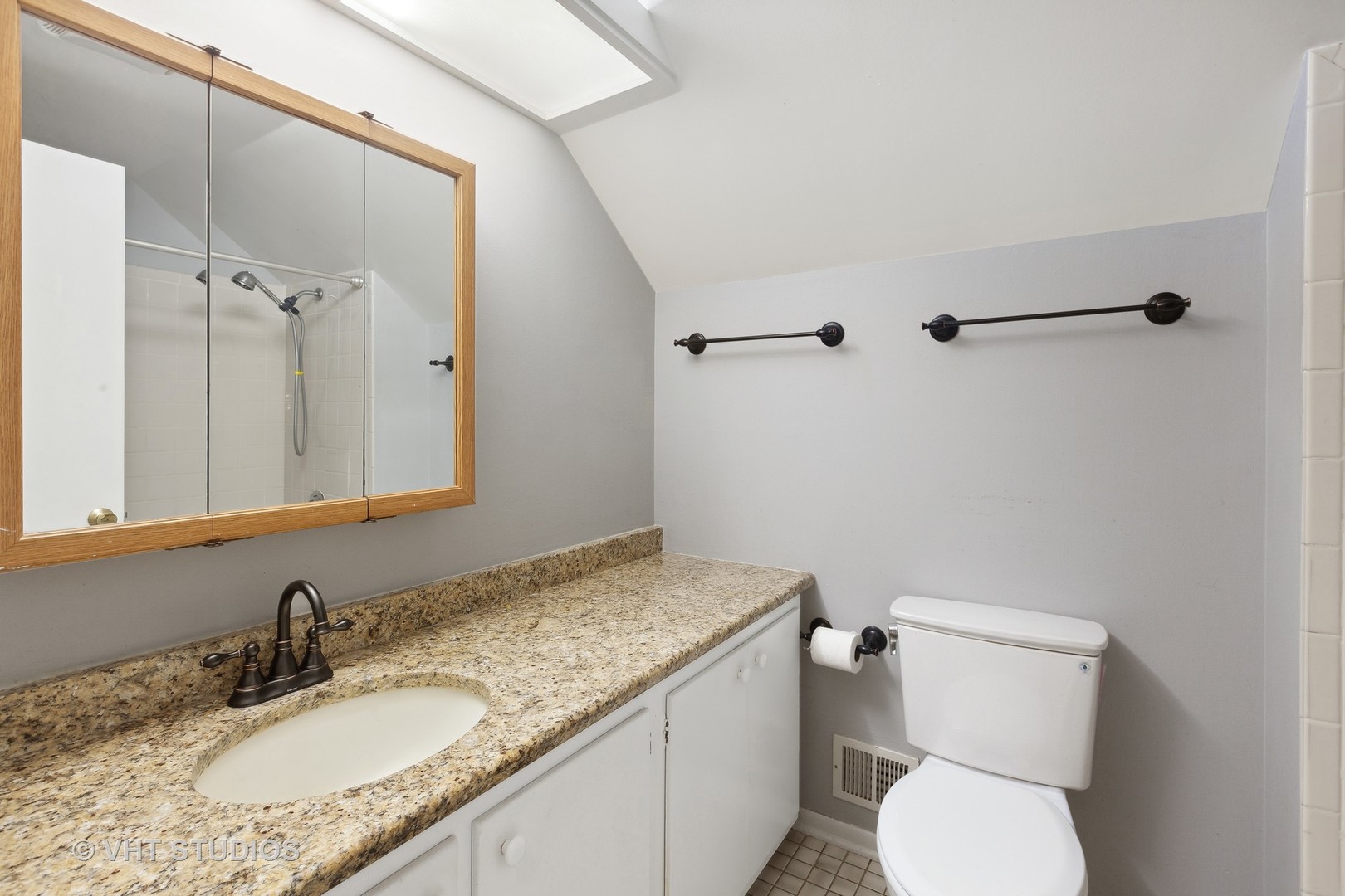 1216 Modaff Road Naperville, IL 60540 - Photo 15 of 25 a bathroom with a granite countertop sink toilet and shower