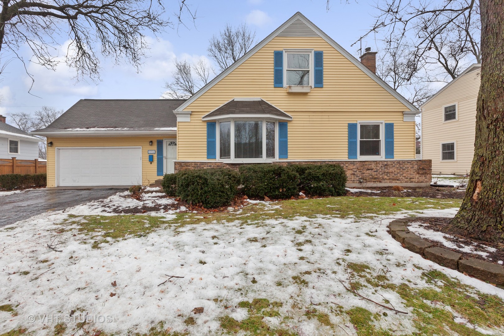 1216 Modaff Road Naperville, IL 60540 - Photo 2 of 25 a front view of a house with a yard