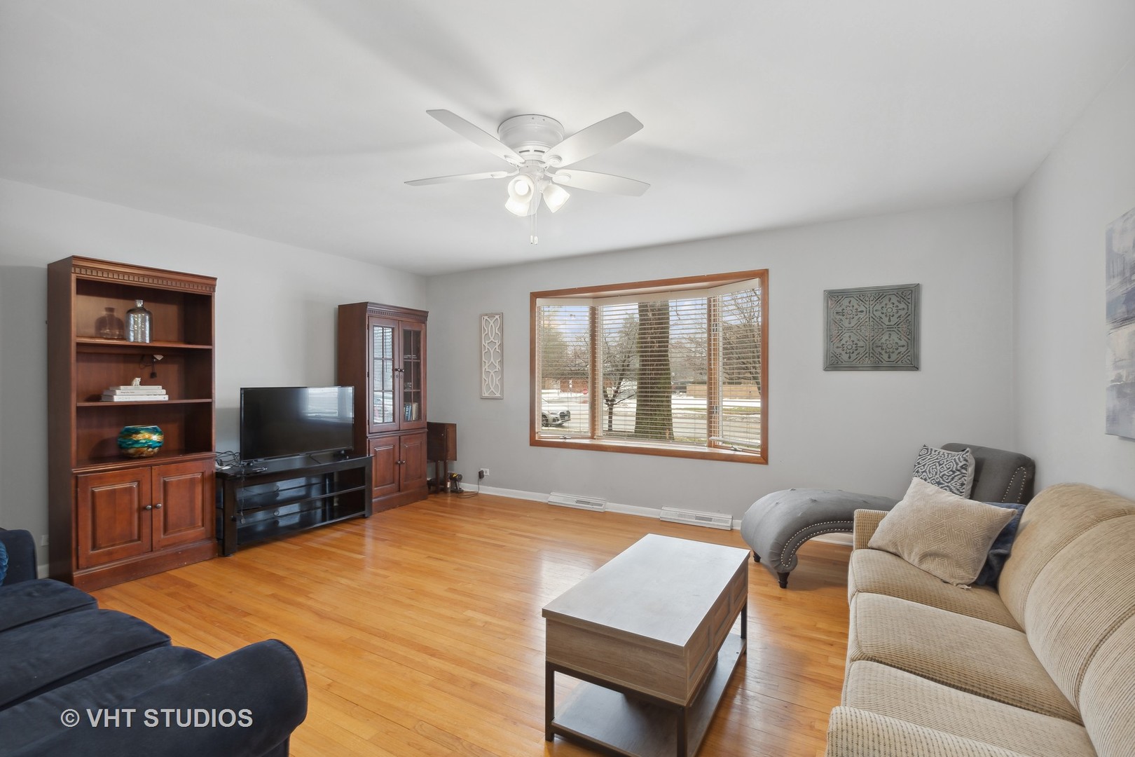 1216 Modaff Road Naperville, IL 60540 - Photo 3 of 25 a living room with furniture and a flat screen tv