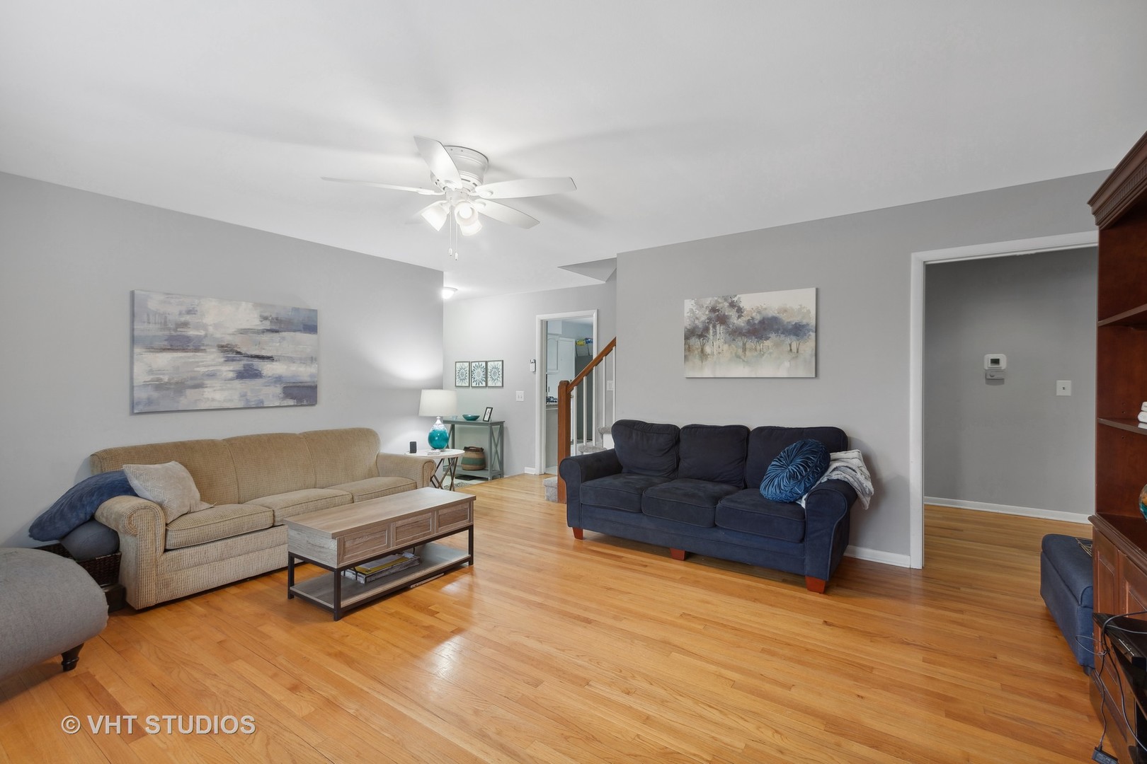 1216 Modaff Road Naperville, IL 60540 - Photo 4 of 25 a living room with furniture and a wooden floor