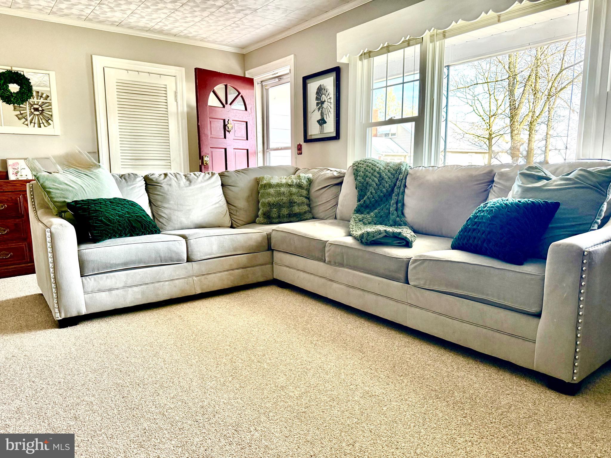 202 4th Street Sharptown, MD 21861 - Photo 19 of 73 a living room with furniture and a large window