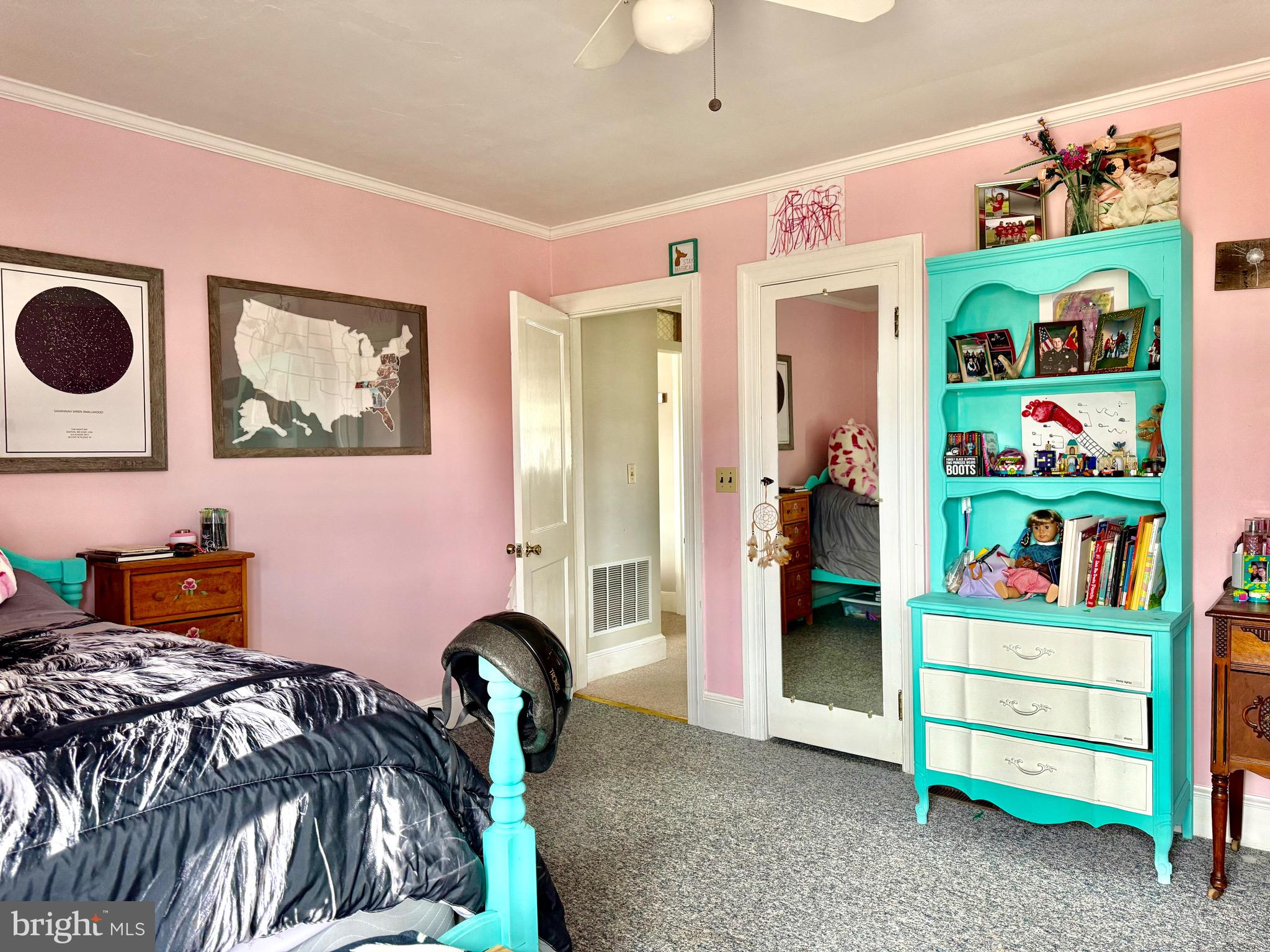 202 4th Street Sharptown, MD 21861 - Photo 30 of 73 a bedroom with a bed and a book shelf