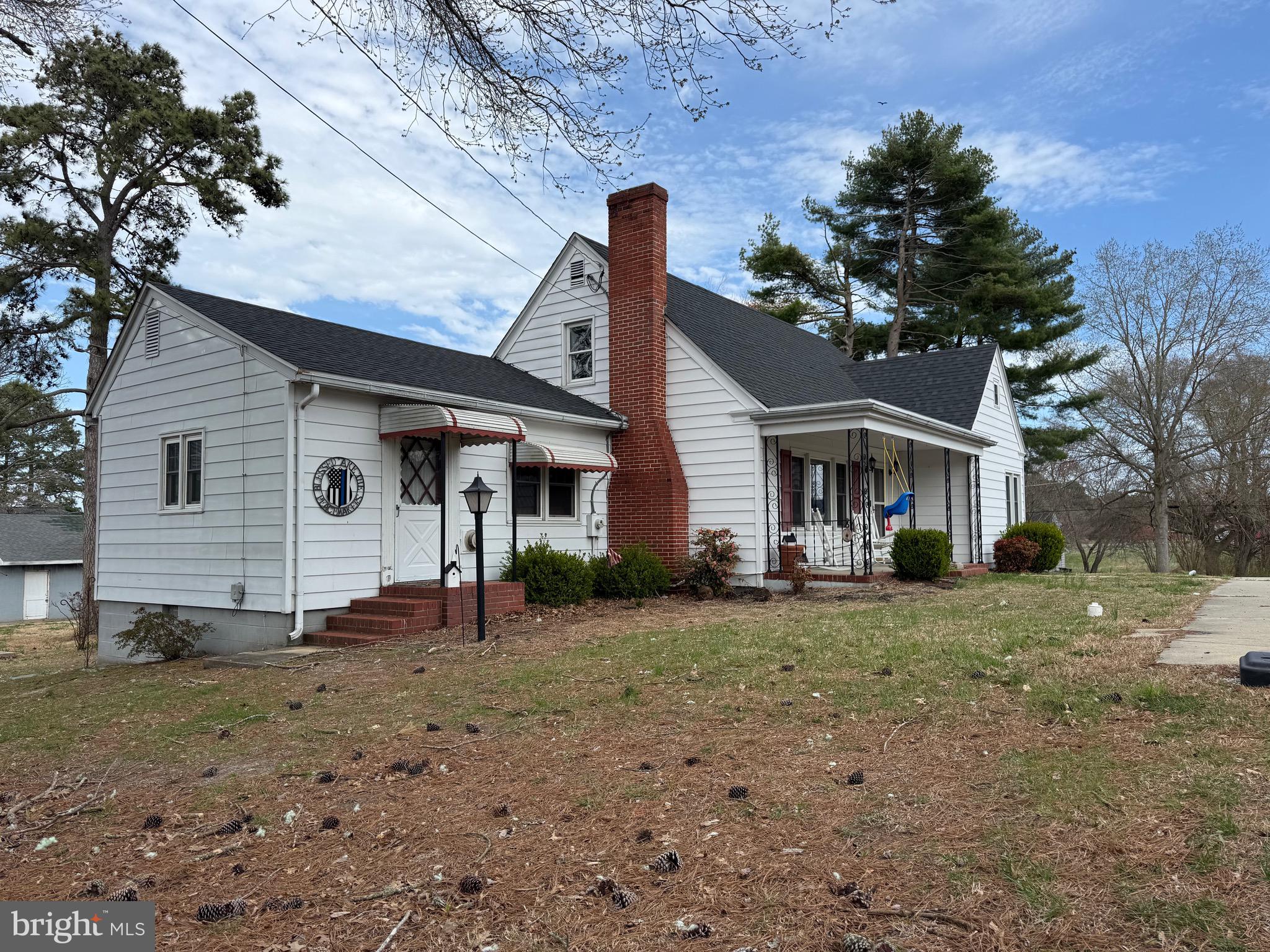 202 4th Street Sharptown, MD 21861 - Photo 3 of 73 a front view of a house with garden