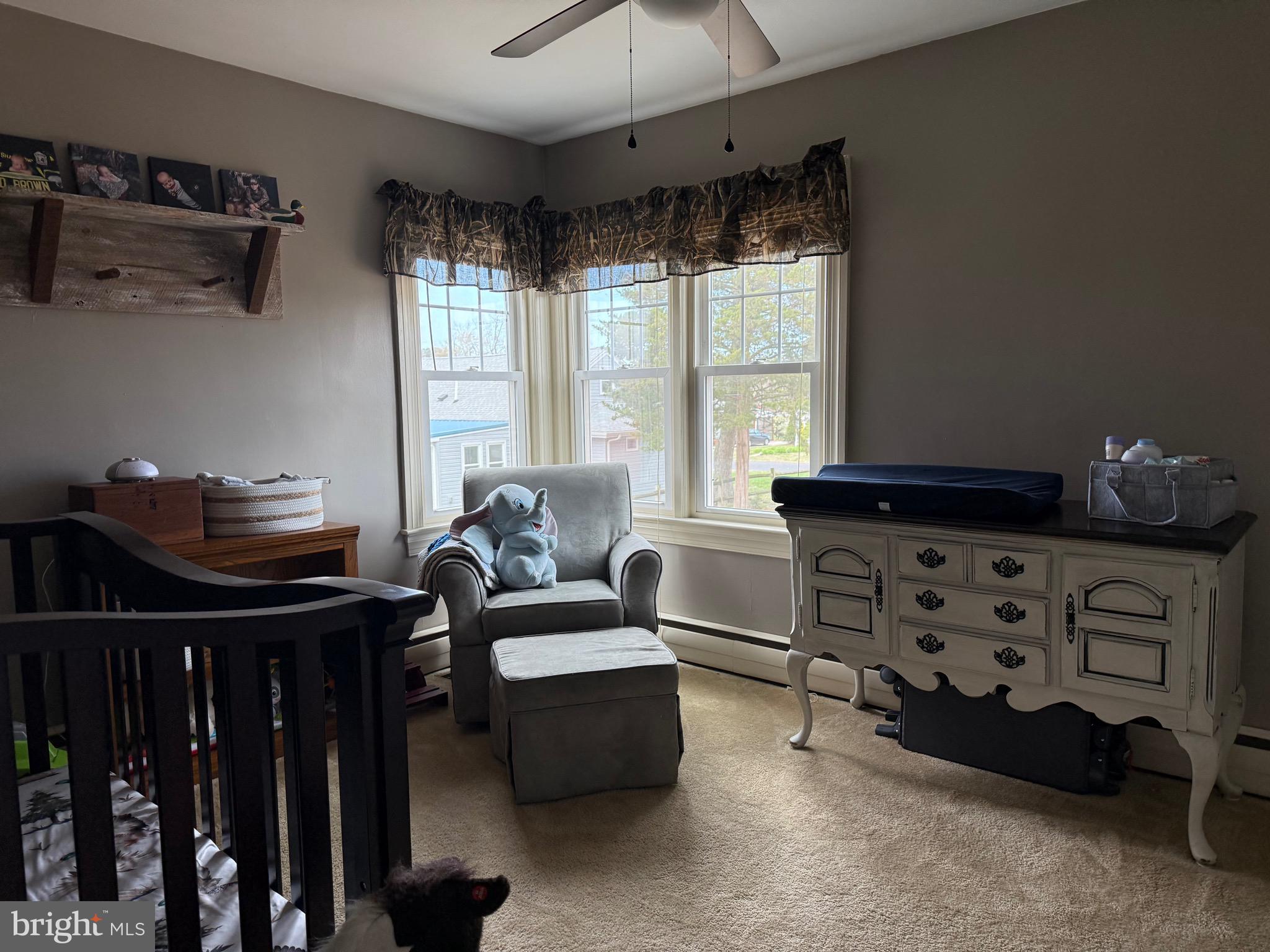 202 4th Street Sharptown, MD 21861 - Photo 32 of 73 a living room with furniture and a window