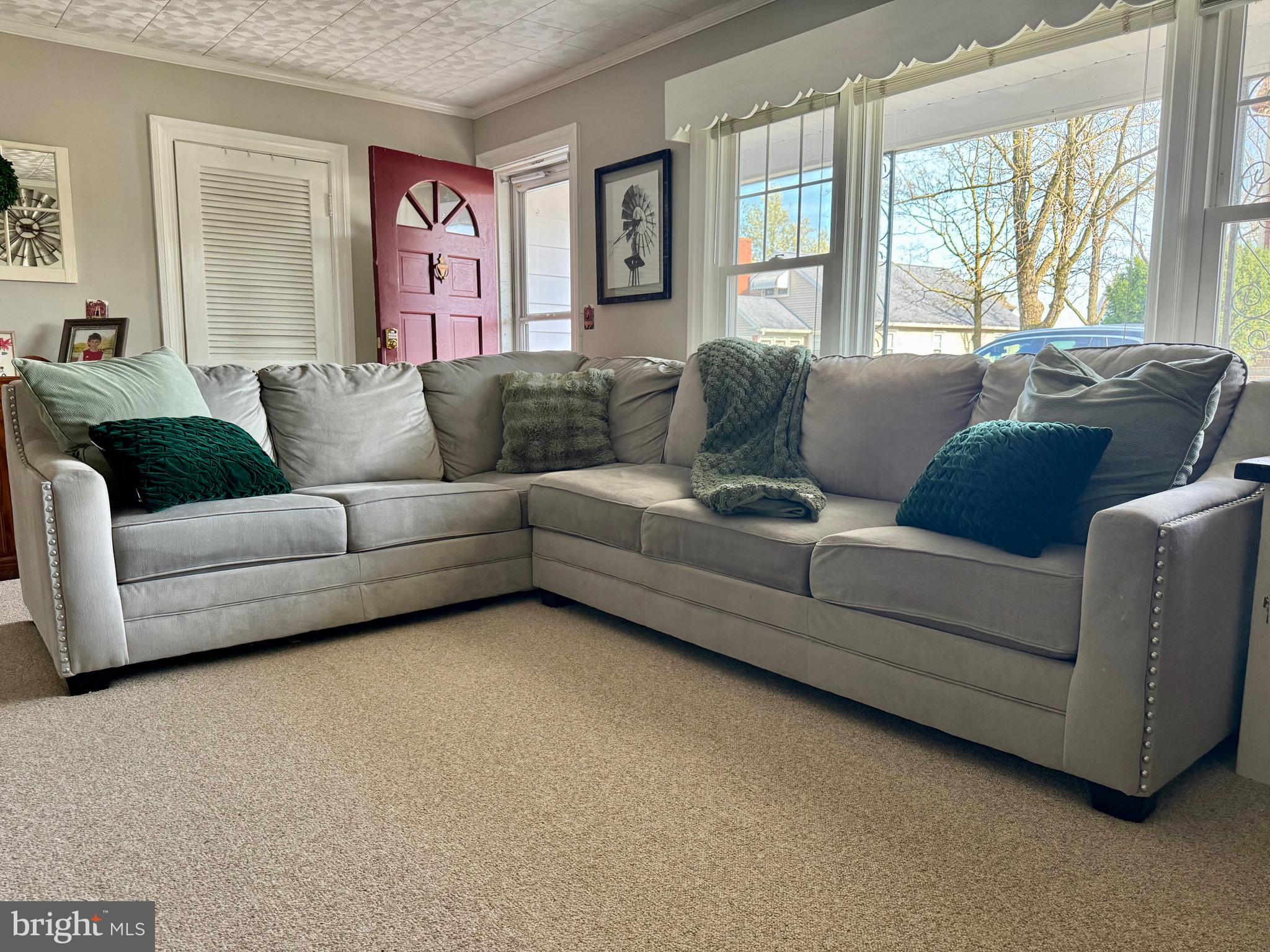 202 4th Street Sharptown, MD 21861 - Photo 34 of 73 a living room with furniture and large windows