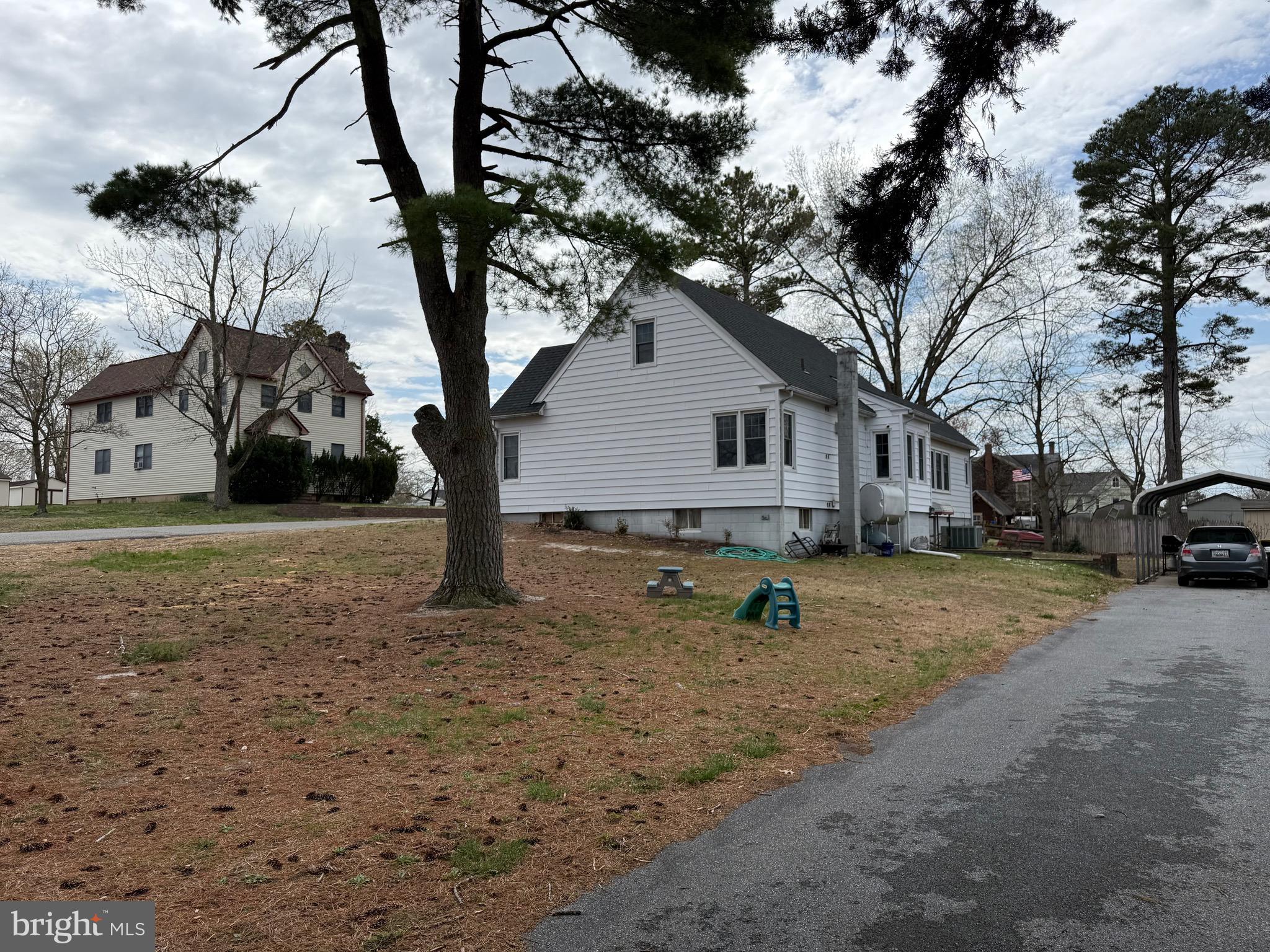 202 4th Street Sharptown, MD 21861 - Photo 38 of 73 a view of a house with a yard