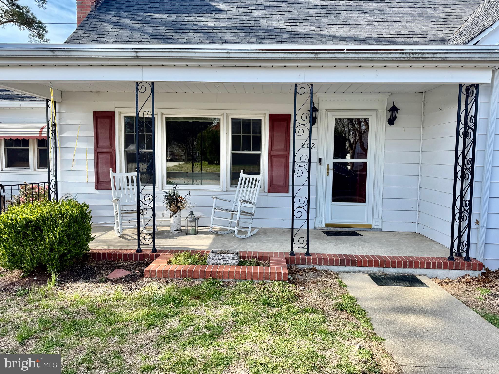202 4th Street Sharptown, MD 21861 - Photo 42 of 73 a front view of a house with porch