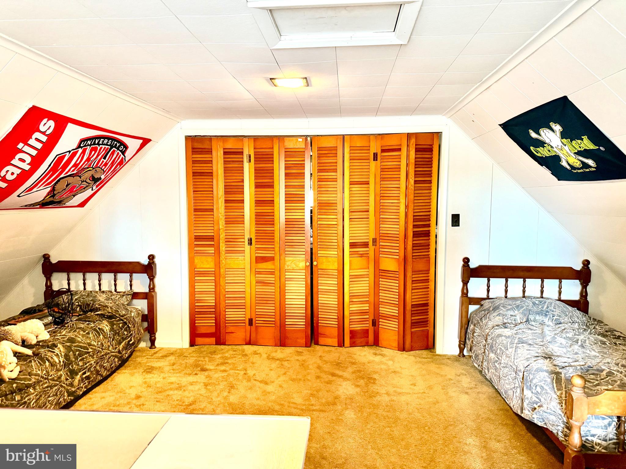 202 4th Street Sharptown, MD 21861 - Photo 48 of 73 a bedroom with a bed and a painting on the wall