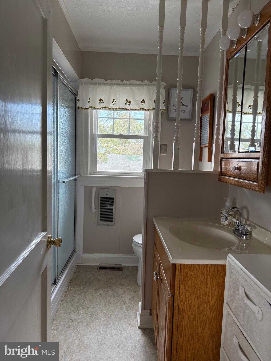 202 4th Street Sharptown, MD 21861 - Photo 50 of 73 a bathroom with a sink and a shower