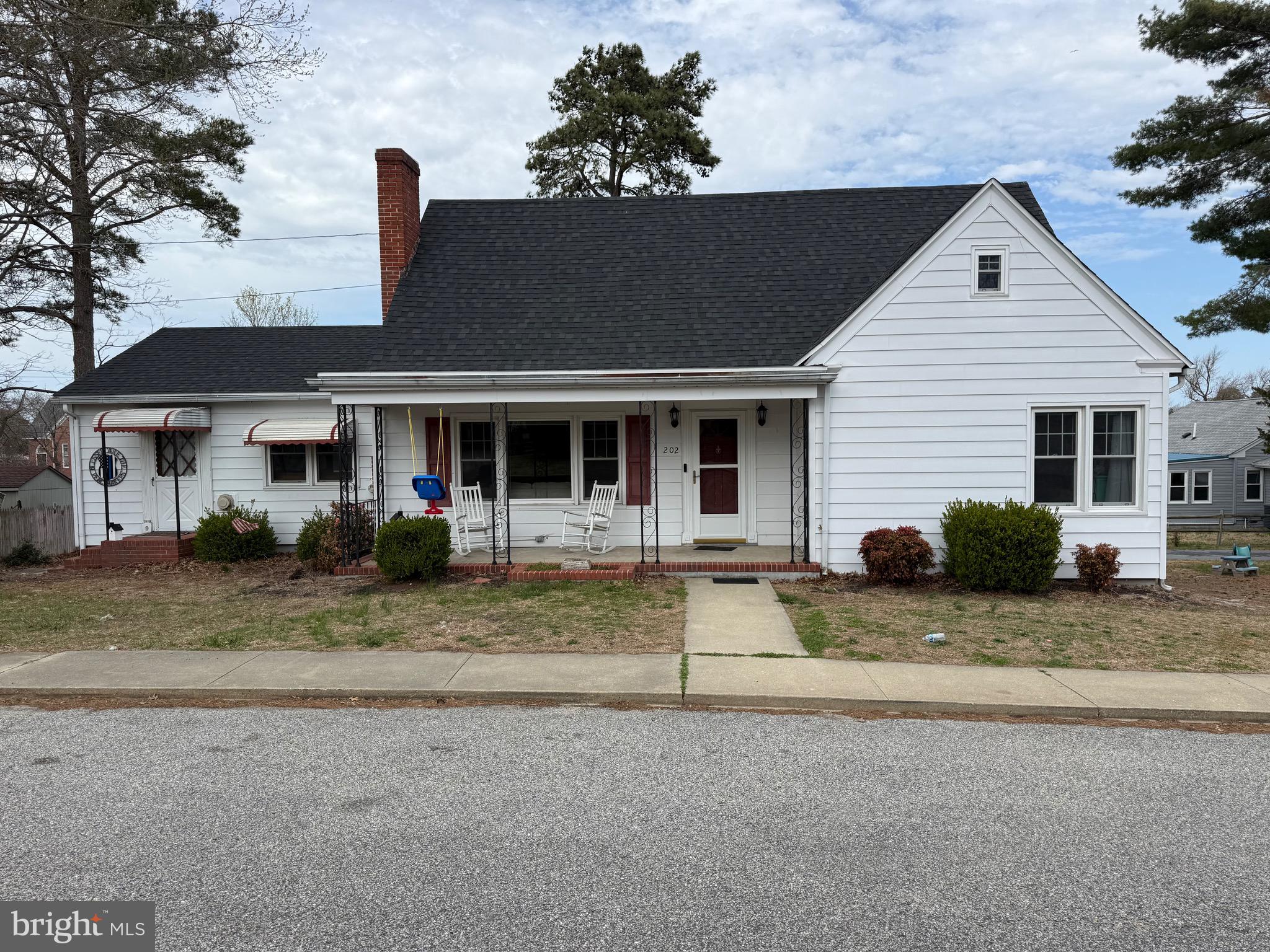 202 4th Street Sharptown, MD 21861 - Photo 64 of 73 a front view of a house with a porch