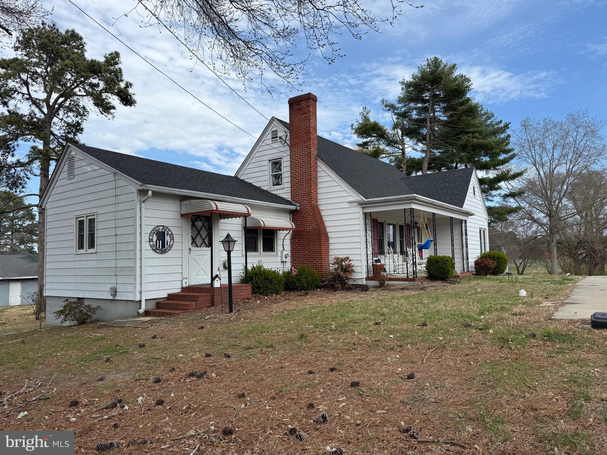 202 4th Street Sharptown, MD 21861 - Photo 67 of 73 a front view of a house with garden