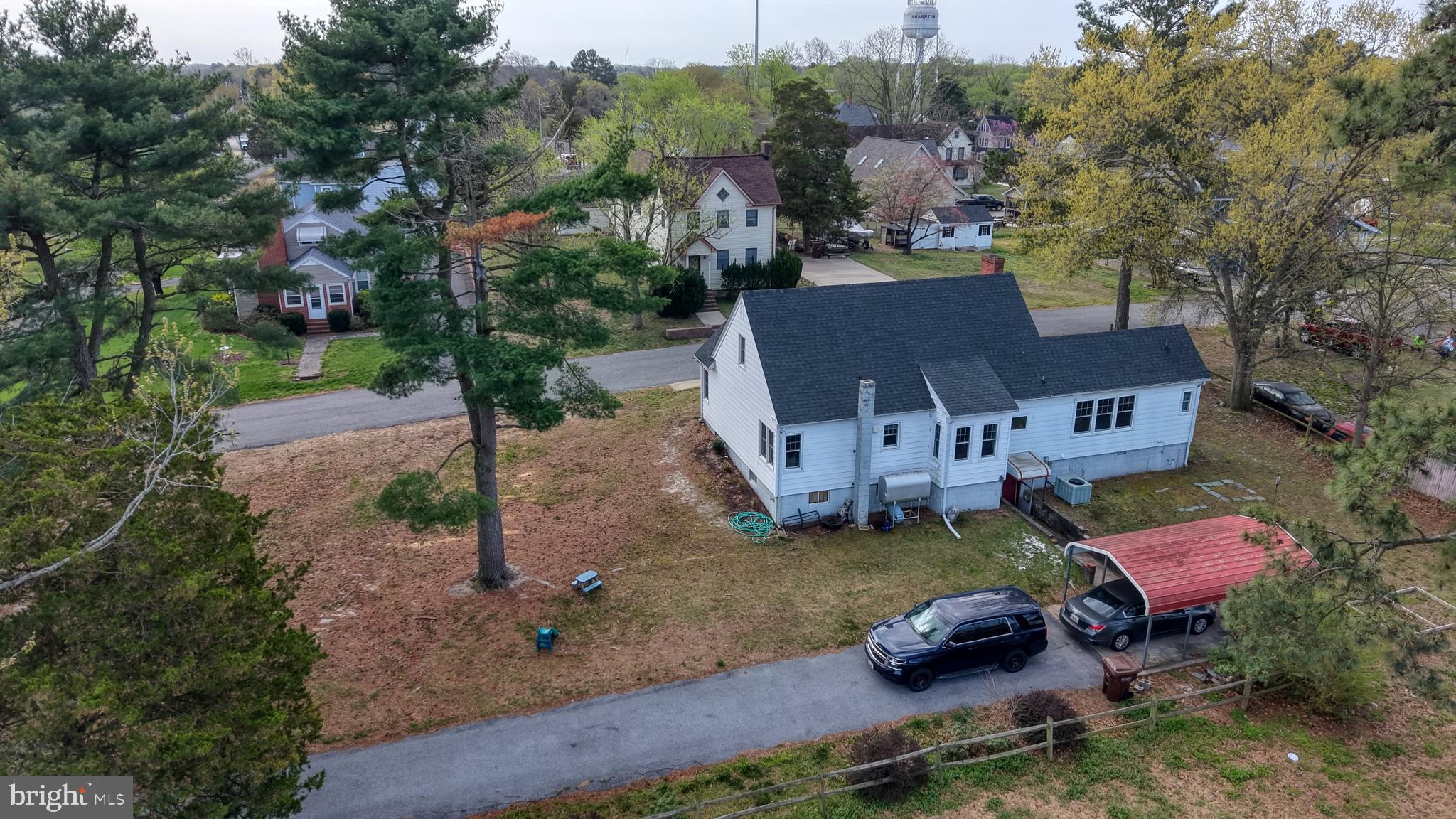 202 4th Street Sharptown, MD 21861 - Photo 69 of 73 an aerial view of a house with a garden