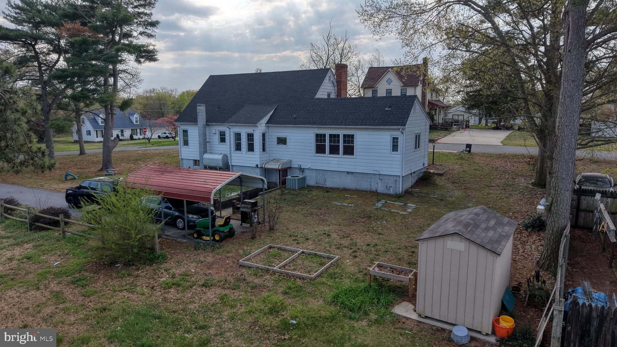 202 4th Street Sharptown, MD 21861 - Photo 70 of 73 an aerial view of a house with a yard