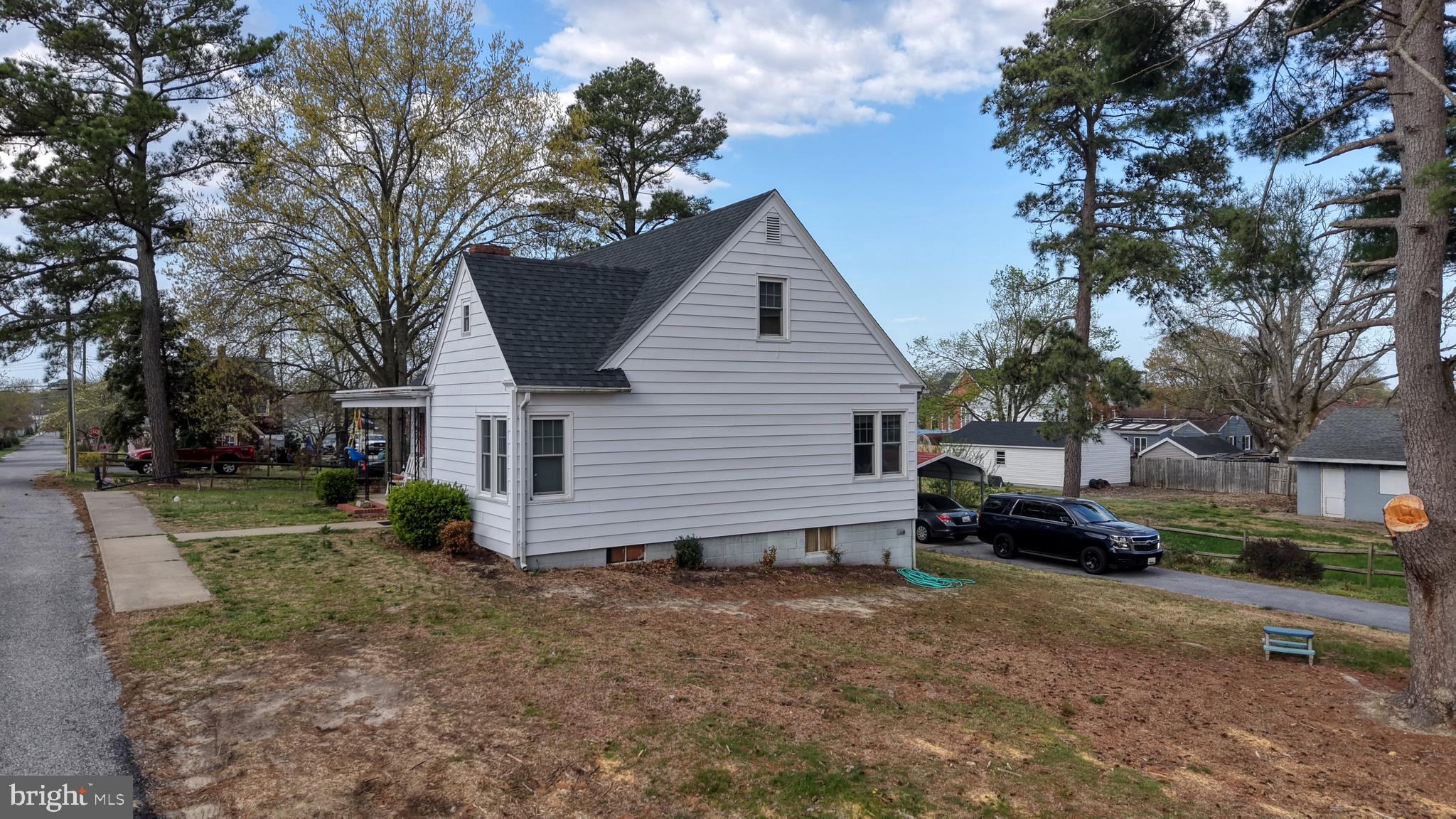 202 4th Street Sharptown, MD 21861 - Photo 72 of 73 a view of a house with a yard