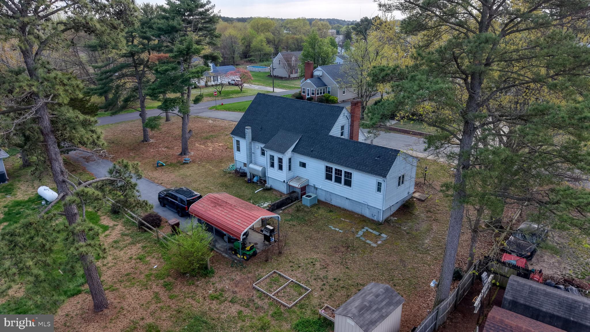 202 4th Street Sharptown, MD 21861 - Photo 8 of 73 an aerial view of a house with garden space and street view
