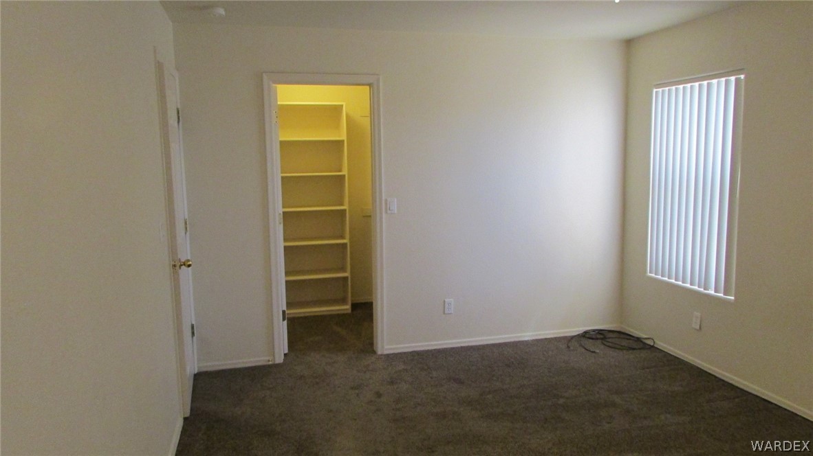 2188 Jamie Road Fort Mohave, AZ 86426 - Photo 15 of 21 a view of an empty room with a window