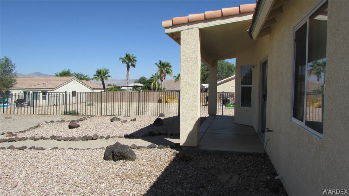 2188 Jamie Road Fort Mohave, AZ 86426 - Photo 19 of 21 a front view of a house with a yard