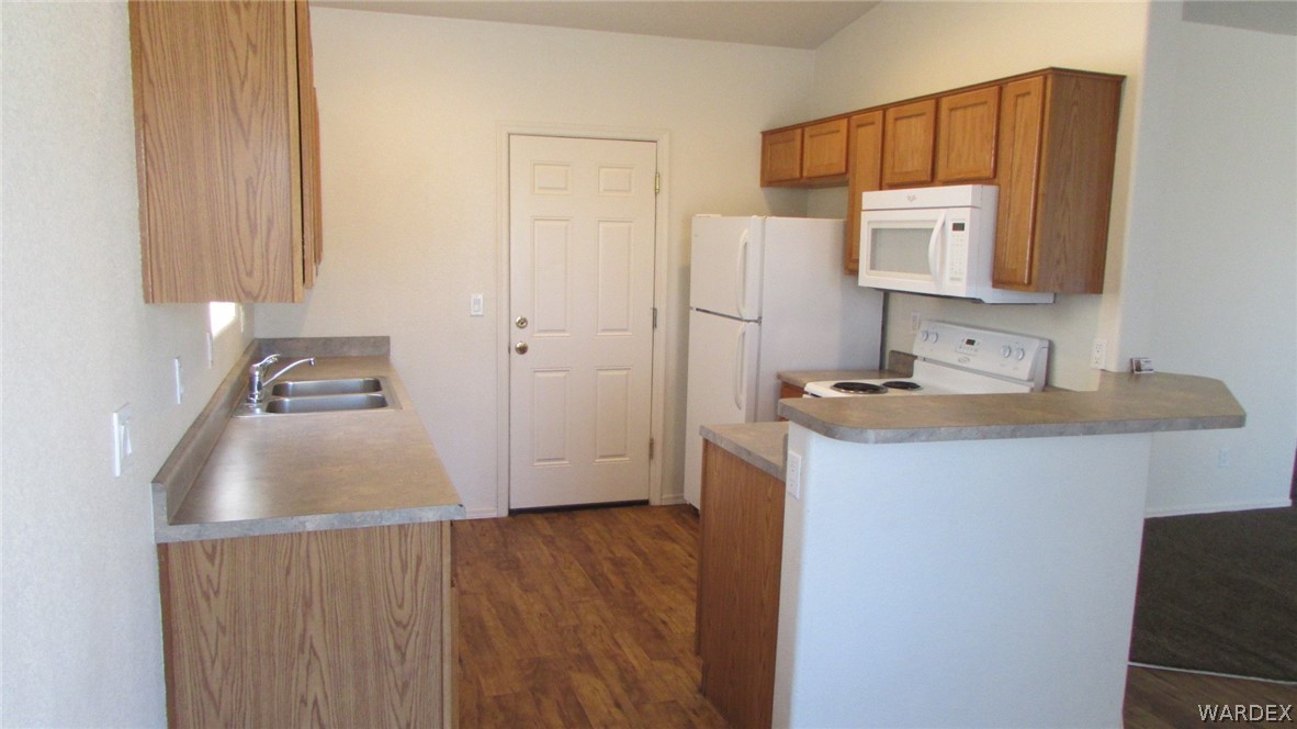 2188 Jamie Road Fort Mohave, AZ 86426 - Photo 2 of 21 a bathroom with a sink a mirror and vanity